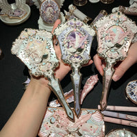 Enchanted Handheld Makeup Mirror for Precise Beauty