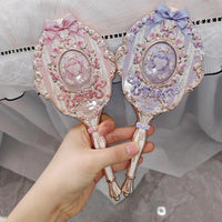 Enchanted Handheld Makeup Mirror for Precise Beauty
