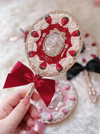 Enchanted Handheld Makeup Mirror for Precise Beauty