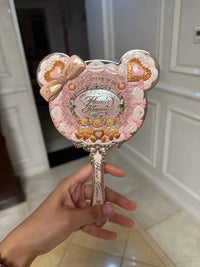 Enchanted Handheld Makeup Mirror for Precise Beauty