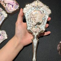 Enchanted Handheld Makeup Mirror for Precise Beauty
