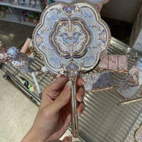 Enchanted Handheld Makeup Mirror for Precise Beauty
