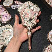 Enchanted Handheld Makeup Mirror for Precise Beauty