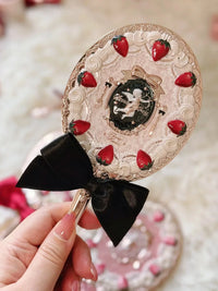 Enchanted Handheld Makeup Mirror for Precise Beauty