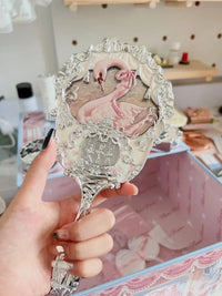 Enchanted Handheld Makeup Mirror for Precise Beauty