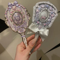Enchanted Handheld Makeup Mirror for Precise Beauty