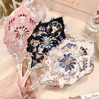 Enchanted Handheld Makeup Mirror for Precise Beauty