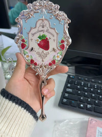 Enchanted Handheld Makeup Mirror for Precise Beauty
